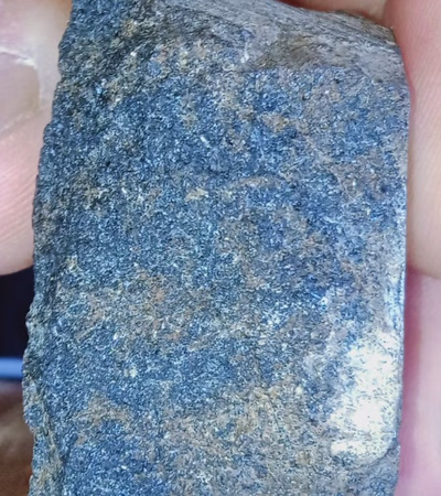 A rock with precious minerals
