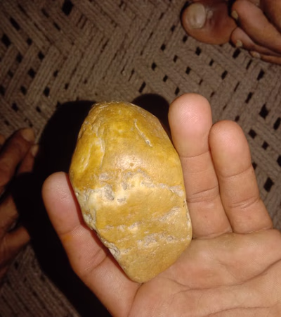 Old stone and gold coins sell