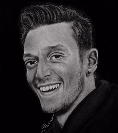 Real Madrid'in efsanelerinden Mesut Özil'in kömürle yapılmış portresi