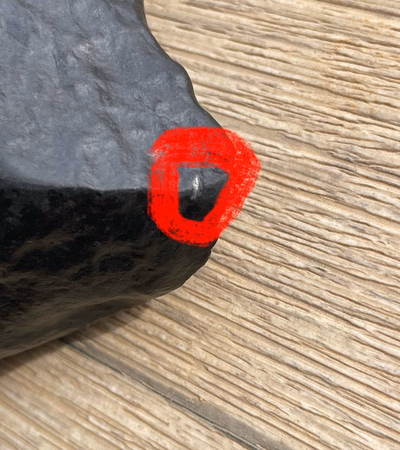 Iron Meteorite: The outer crust of the meteorite indicates that it is recently fallen