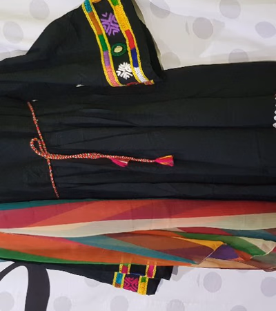 Sewing custom Afghan clothes With different designs in desired colors