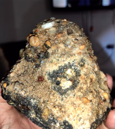 A stone containing precious gemstones
